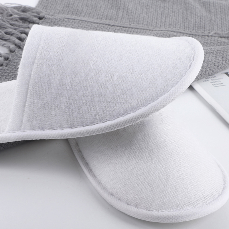 Latest Cheap Personalized Hotel Spa Disposable slippers Men and Women Wholesale Eco Degradable Dipos slippers Manufacturer detail