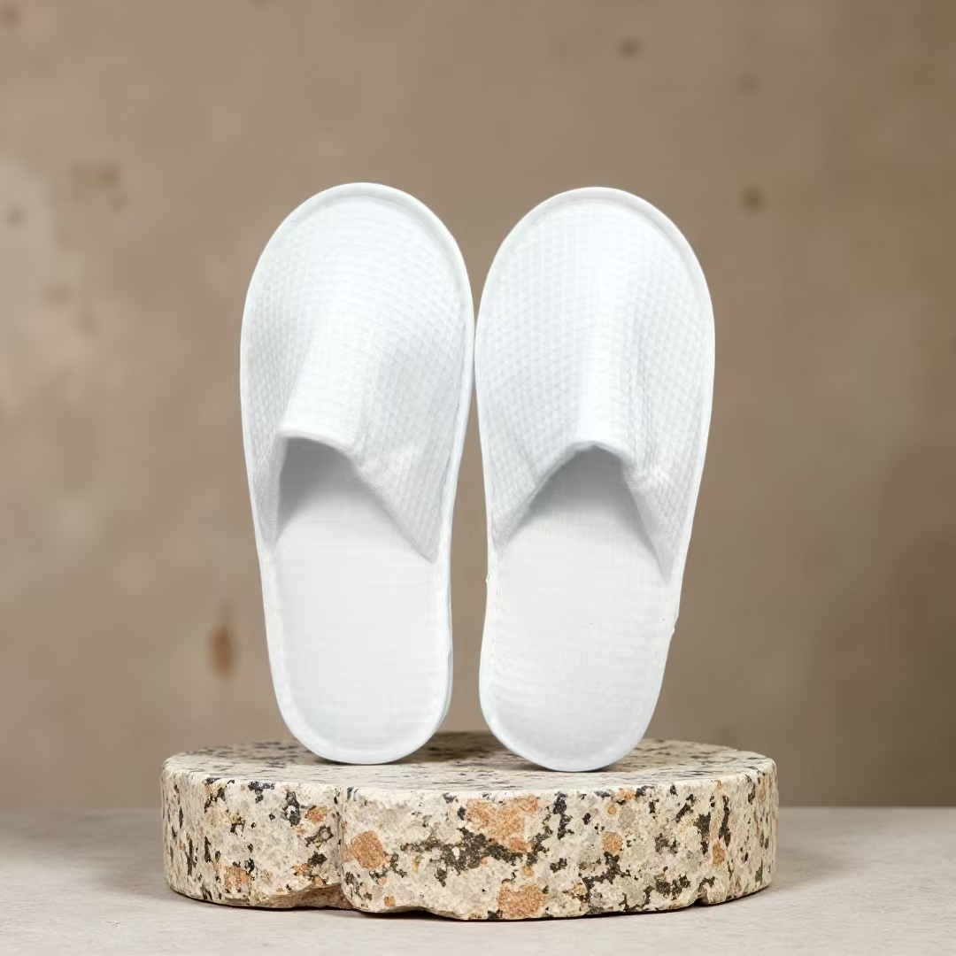 Custom Embroidered Disposable Hotel Slippers-Waffle Fabric Guest Slippers Non-slip CXPE Sole Breathable Soft Hotel Amenities Set product view