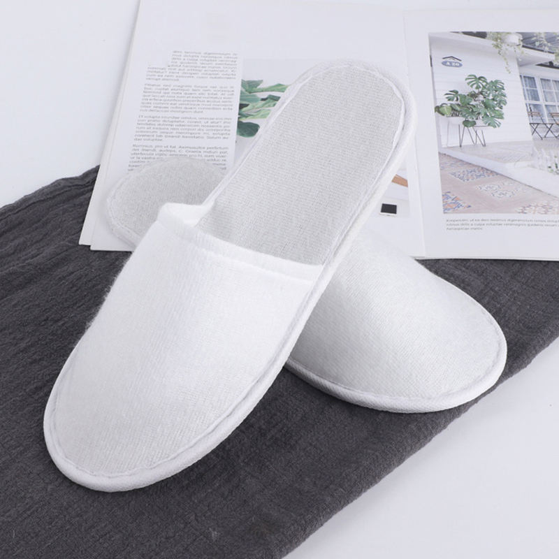 Latest Cheap Personalized Hotel Spa Disposable slippers Men and Women Wholesale Eco Degradable Dipos slippers Manufacturer product view