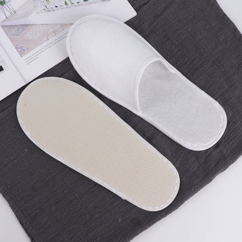 Latest Cheap Personalized Hotel Spa Disposable slippers Men and Women Wholesale Eco Degradable Dipos slippers Manufacturer product view