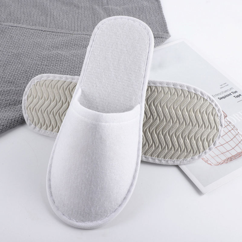 Latest Cheap Personalized Hotel Spa Disposable slippers Men and Women Wholesale Eco Degradable Dipos slippers Manufacturer product view