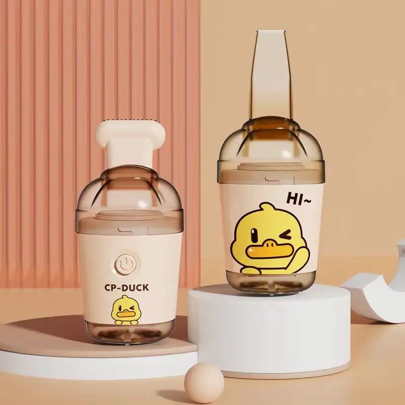 Desktop vacuum cleaner powerful rubber slag suction Yellow duck handheld cleaner Mini vacuum cleaner for children and students product view