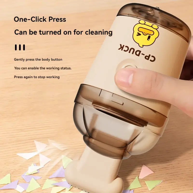 Desktop vacuum cleaner powerful rubber slag suction Yellow duck handheld cleaner Mini vacuum cleaner for children and students product view
