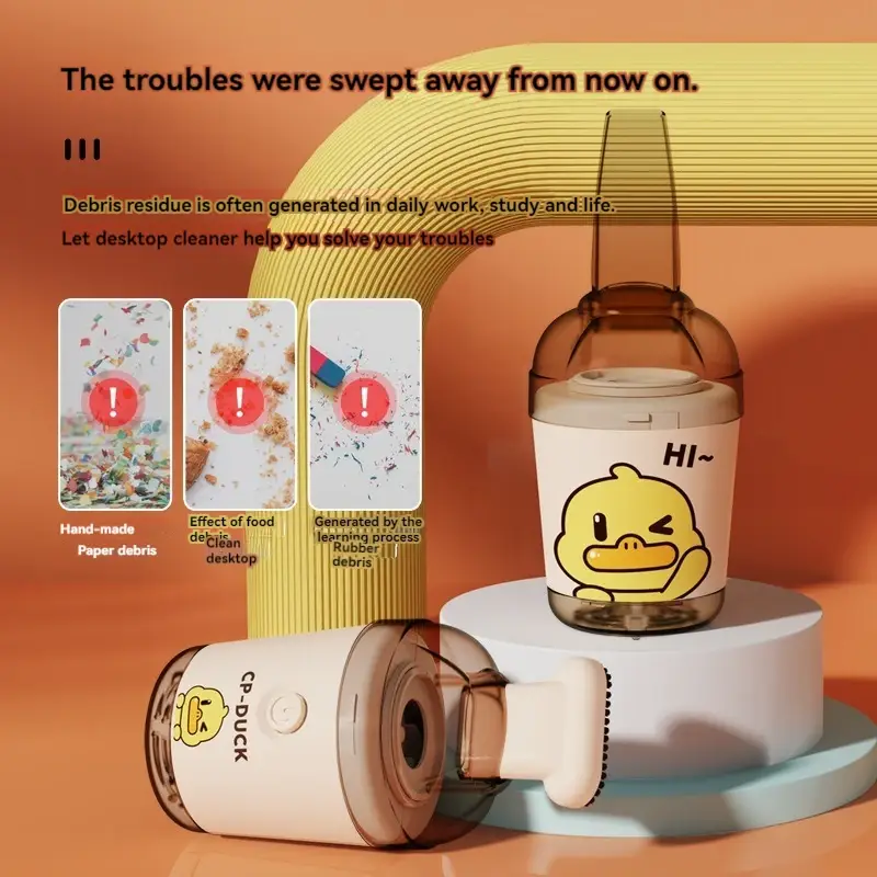 Desktop vacuum cleaner powerful rubber slag suction Yellow duck handheld cleaner Mini vacuum cleaner for children and students product view