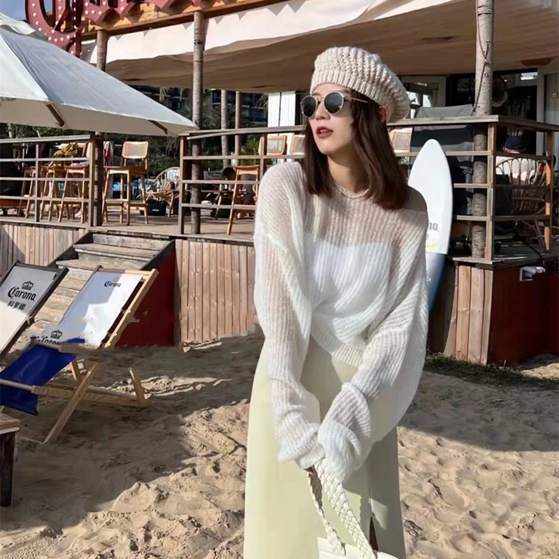 Simple Hollow Out Lightweight Long Sleeved Knitted Sweater Spring New Solid Color Womens Pullover Summer Sunscreen Knitted Tops detail