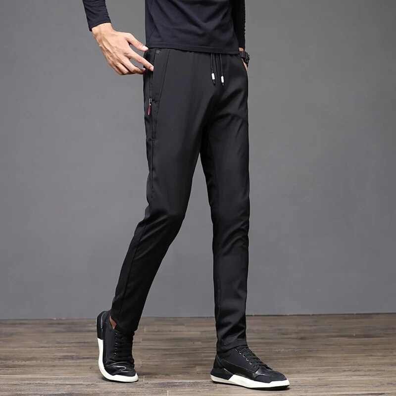 Winter Men's Warm Light Fleece Casual Pants Slim Fit Classic Sports Pants Solid Color Windproof Pants.