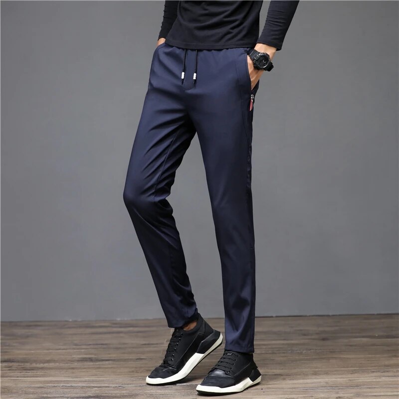 Winter Men's Warm Light Fleece Casual Pants Slim Fit Classic Sports Pants Solid Color Windproof Pants.