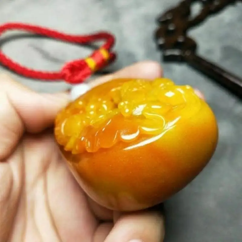 Antique Huanglong Jade Pendant: Delicate Goldfish Swimming Design