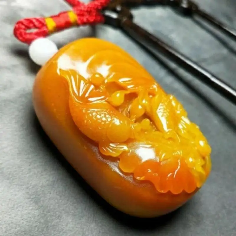 Antique Huanglong Jade Pendant: Delicate Goldfish Swimming Design