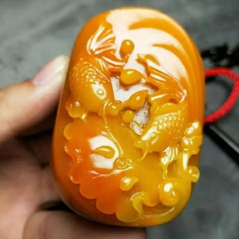 Antique Huanglong Jade Pendant: Delicate Goldfish Swimming Design