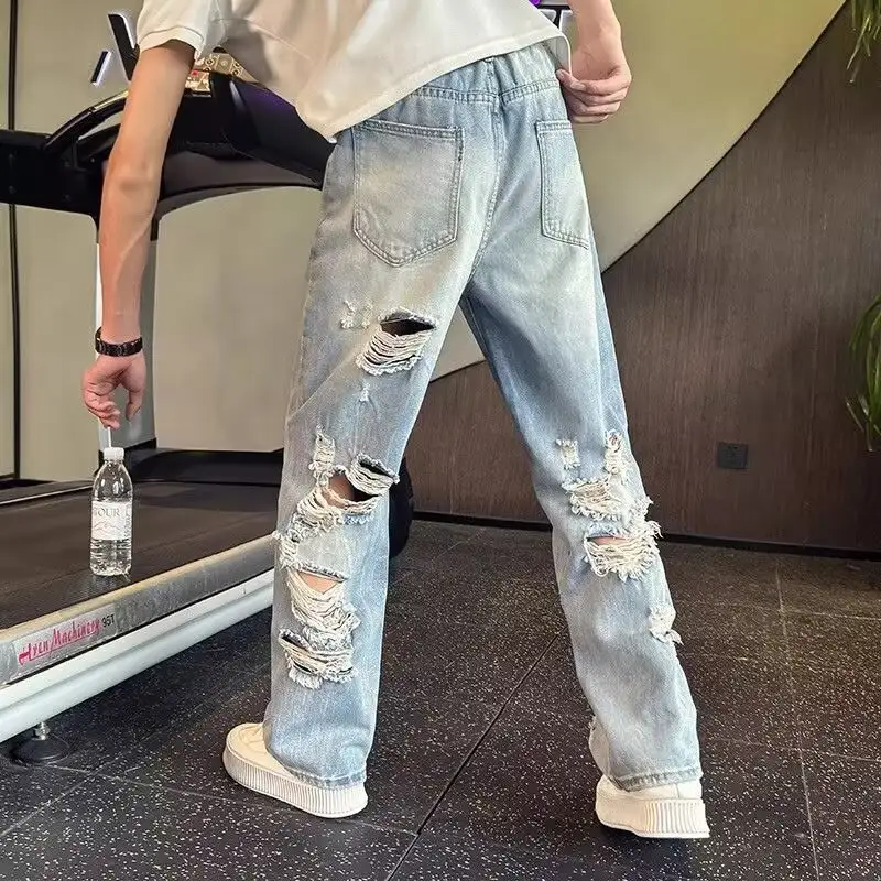 New Ripped Jeans With Big Rips At The Back Waistband